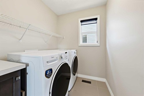 71 Chaparral Valley Way Se, Calgary, AB - Indoor Photo Showing Laundry Room