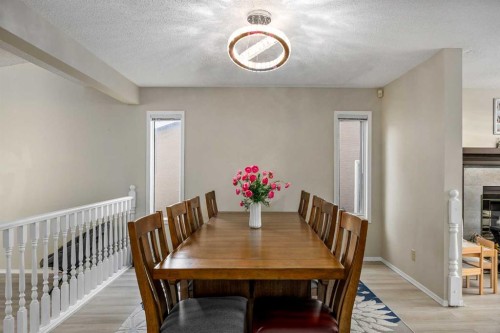 52 Shawnee Way Sw, Calgary, AB - Indoor Photo Showing Dining Room