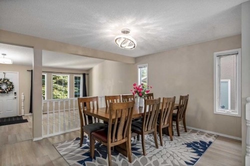 52 Shawnee Way Sw, Calgary, AB - Indoor Photo Showing Dining Room