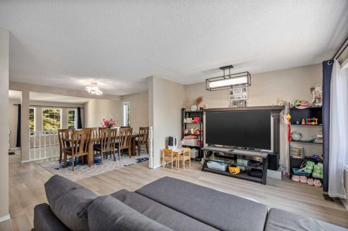 52 Shawnee Way Sw, Calgary, AB - Indoor Photo Showing Other Room