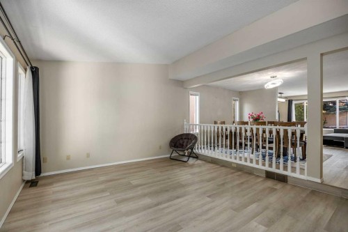 52 Shawnee Way Sw, Calgary, AB - Indoor Photo Showing Other Room