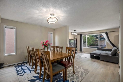 52 Shawnee Way Sw, Calgary, AB - Indoor Photo Showing Other Room