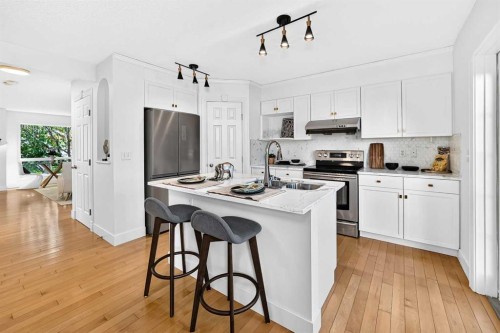 187 Arbour Meadows Close Nw, Calgary, AB - Indoor Photo Showing Kitchen With Double Sink