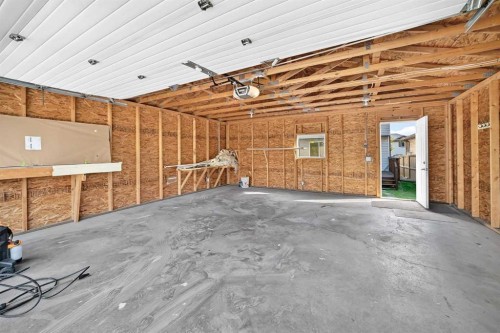 187 Arbour Meadows Close Nw, Calgary, AB - Indoor Photo Showing Garage
