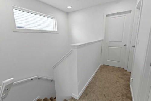 25 Savanna Manor Ne, Calgary, AB - Indoor Photo Showing Other Room