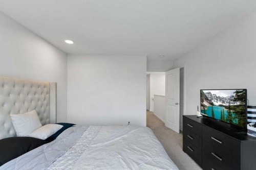 25 Savanna Manor Ne, Calgary, AB - Indoor Photo Showing Bedroom