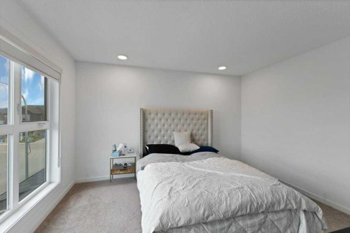 25 Savanna Manor Ne, Calgary, AB - Indoor Photo Showing Bedroom