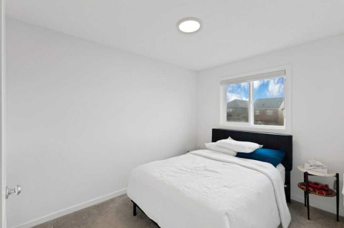 25 Savanna Manor Ne, Calgary, AB - Indoor Photo Showing Bedroom