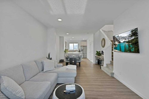 25 Savanna Manor Ne, Calgary, AB - Indoor Photo Showing Living Room