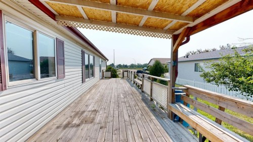 1905 29 Avenue, Nanton, AB - Outdoor With Deck Patio Veranda With Exterior