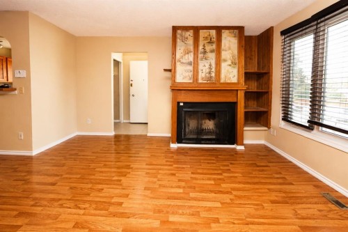 7 Dovercliffe Way Se, Calgary, AB - Indoor With Fireplace