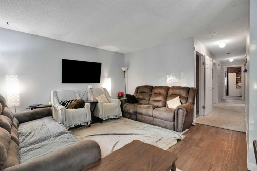 3429 Cedarille Drive Sw, Calgary, AB - Indoor Photo Showing Living Room