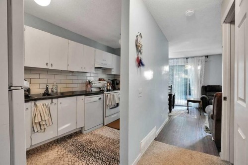 3429 Cedarille Drive Sw, Calgary, AB - Indoor Photo Showing Kitchen With Double Sink