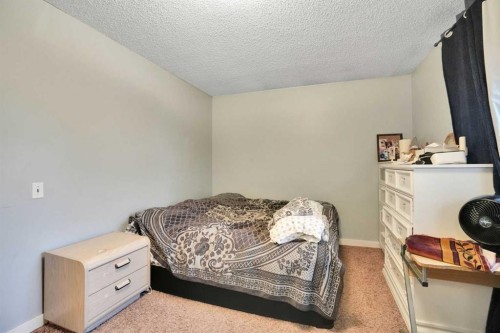 3429 Cedarille Drive Sw, Calgary, AB - Indoor Photo Showing Bedroom