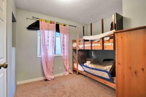 3429 Cedarille Drive Sw, Calgary, AB - Indoor Photo Showing Bedroom