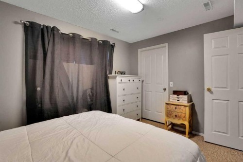 3429 Cedarille Drive Sw, Calgary, AB - Indoor Photo Showing Bedroom