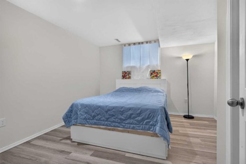 113 Riverview Court West, Calgary, AB - Indoor Photo Showing Bedroom