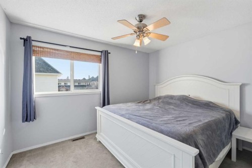 160 Promenade Way Se, Calgary, AB - Indoor Photo Showing Bedroom