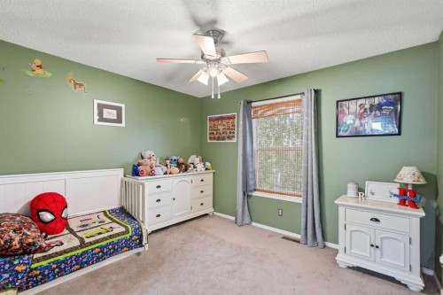 160 Promenade Way Se, Calgary, AB - Indoor Photo Showing Bedroom
