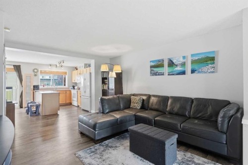 160 Promenade Way Se, Calgary, AB - Indoor Photo Showing Living Room