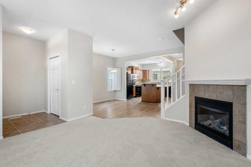 51 Covehaven Mews Ne, Calgary, AB - Indoor Photo Showing Living Room With Fireplace