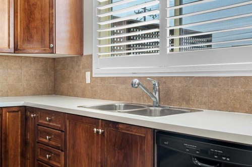51 Covehaven Mews Ne, Calgary, AB - Indoor Photo Showing Kitchen With Double Sink