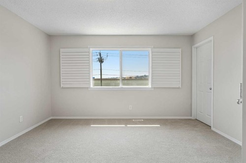 51 Covehaven Mews Ne, Calgary, AB - Indoor Photo Showing Other Room