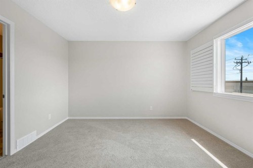 51 Covehaven Mews Ne, Calgary, AB - Indoor Photo Showing Other Room