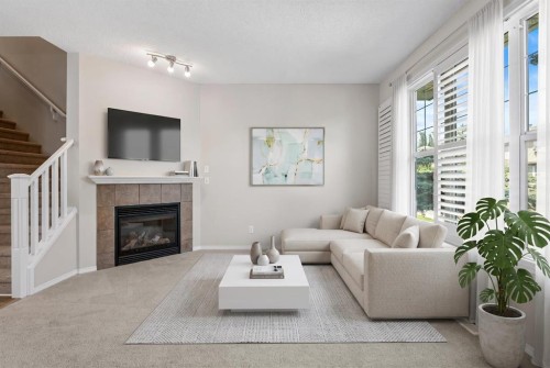 51 Covehaven Mews Ne, Calgary, AB - Indoor Photo Showing Living Room With Fireplace