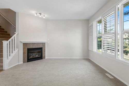51 Covehaven Mews Ne, Calgary, AB - Indoor With Fireplace