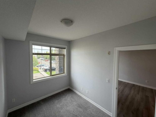 219-117 Copperpond Common Se, Calgary, AB - Indoor Photo Showing Other Room