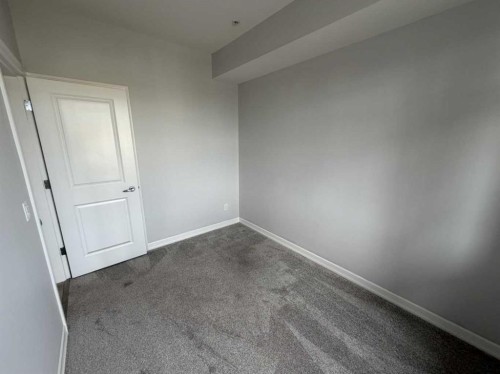 219-117 Copperpond Common Se, Calgary, AB - Indoor Photo Showing Other Room
