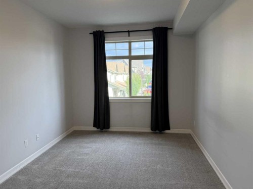 219-117 Copperpond Common Se, Calgary, AB - Indoor Photo Showing Other Room