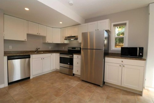 52 Mt Aberdeen Circle Se, Calgary, AB - Indoor Photo Showing Kitchen With Stainless Steel Kitchen