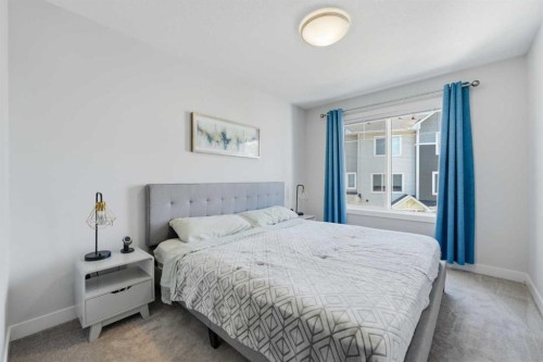 535 Canals Crossing Sw, Airdrie, AB - Indoor Photo Showing Bedroom