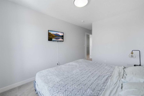 535 Canals Crossing Sw, Airdrie, AB - Indoor Photo Showing Bedroom