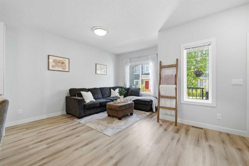 535 Canals Crossing Sw, Airdrie, AB - Indoor Photo Showing Living Room
