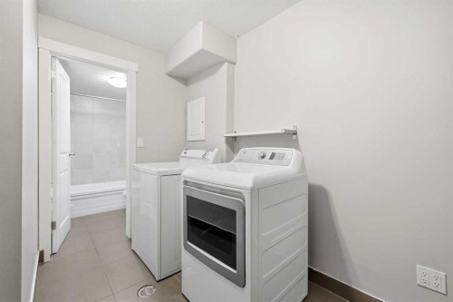 B-2115 35 Avenue Sw, Calgary, AB - Indoor Photo Showing Laundry Room