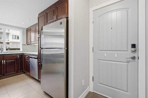 B-2115 35 Avenue Sw, Calgary, AB - Indoor Photo Showing Kitchen With Stainless Steel Kitchen