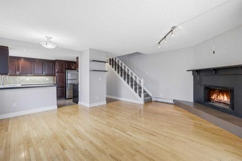 B-2115 35 Avenue Sw, Calgary, AB - Indoor With Fireplace