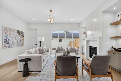 2533 2 Avenue Nw, Calgary, AB - Indoor Photo Showing Living Room With Fireplace