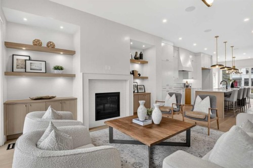 2533 2 Avenue Nw, Calgary, AB - Indoor Photo Showing Living Room With Fireplace