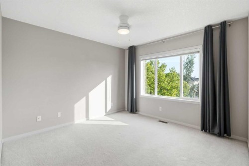 209 Copperpond Row Se, Calgary, AB - Indoor Photo Showing Other Room