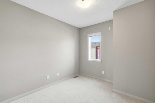 209 Copperpond Row Se, Calgary, AB - Indoor Photo Showing Other Room