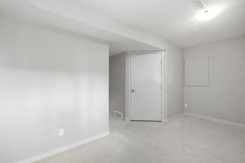 209 Copperpond Row Se, Calgary, AB - Indoor Photo Showing Other Room