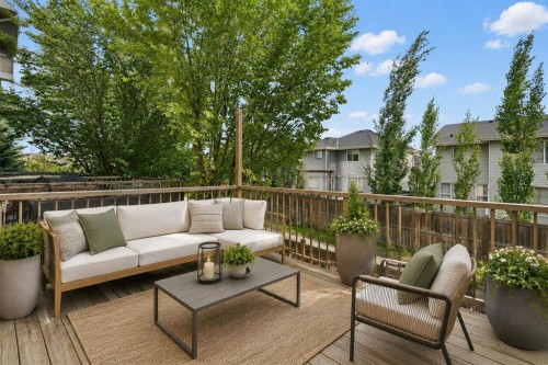 209 Copperpond Row Se, Calgary, AB - Outdoor With Deck Patio Veranda With Exterior