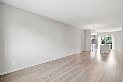 209 Copperpond Row Se, Calgary, AB - Indoor Photo Showing Living Room