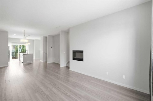209 Copperpond Row Se, Calgary, AB - Indoor Photo Showing Living Room