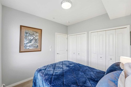 212-4150 Seton Drive Sw, Calgary, AB - Indoor Photo Showing Bedroom