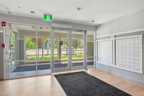 212-4150 Seton Drive Sw, Calgary, AB - Indoor Photo Showing Other Room